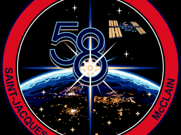 900px-ISS_Expedition_58_Patch.png